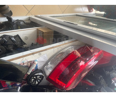 Headlight and front bumper